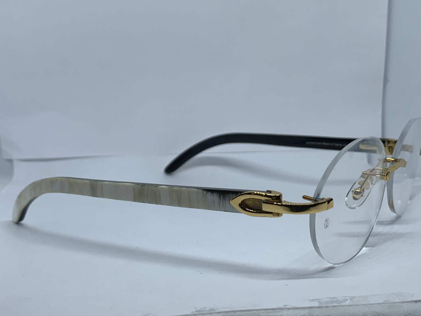 Cartier Decor C White Buffs with Swirls 58 Clear Oval Lenses