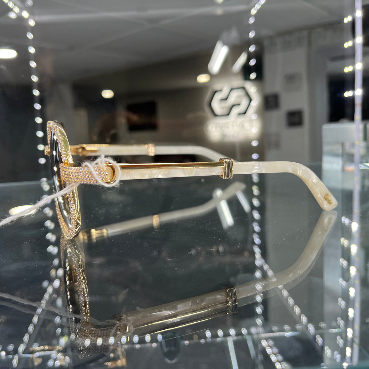 Bagatelle (Iced) - 56-16 Gold White Marble Composites Sunglasses w/ Diamond Frame & Brown Lenses